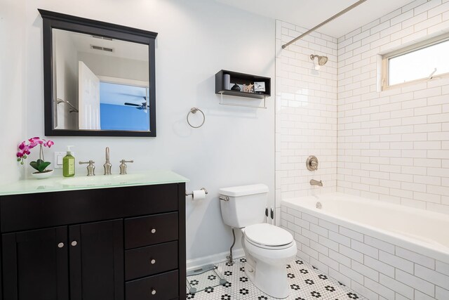 210 Des Plaines Ave Unit B, Forest Park, IL 60130 - full bathroom with vanity, toilet, tiled shower / bath, tile patterned flooring, and baseboards