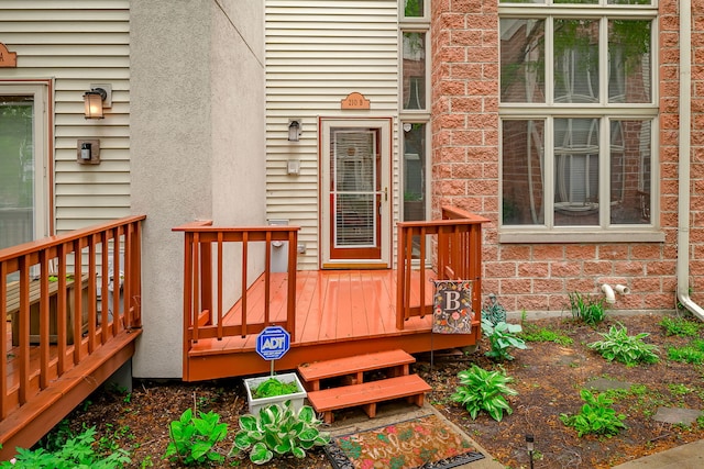 210 Des Plaines Ave Unit B, Forest Park, IL 60130 - property entrance featuring a deck and stone siding