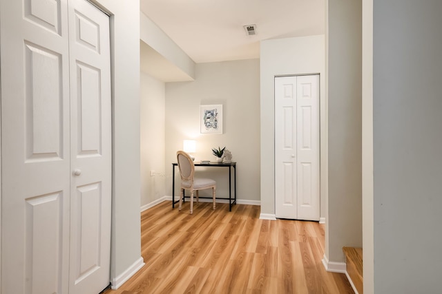 210 Des Plaines Ave Unit B, Forest Park, IL 60130 - hallway with light wood-type flooring and baseboards