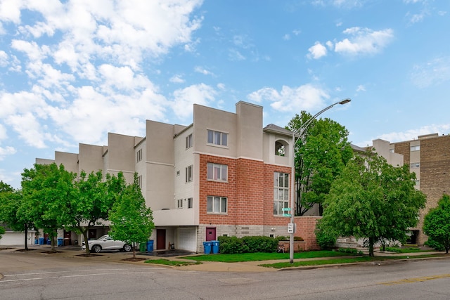 210 Des Plaines Ave Unit B, Forest Park, IL 60130 - view of building exterior with a garage