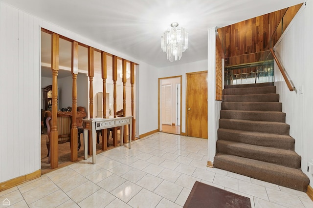 9620 S Sangamon St, Chicago, IL 60643 - foyer featuring stairs, a chandelier, baseboards, and light tile patterned floors