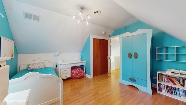 5247 Greenwood St, Skokie, IL 60077 - bedroom featuring wood finished floors, lofted ceiling, and a closet