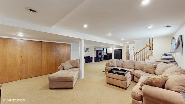 5247 Greenwood St, Skokie, IL 60077 - living area featuring light colored carpet, stairway, and recessed lighting