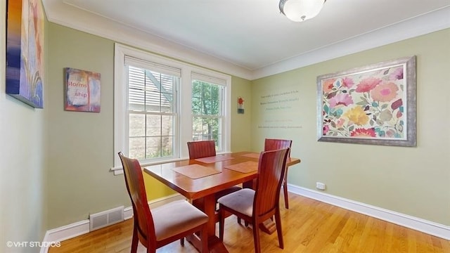 5247 Greenwood St, Skokie, IL 60077 - dining space with light wood finished floors and baseboards