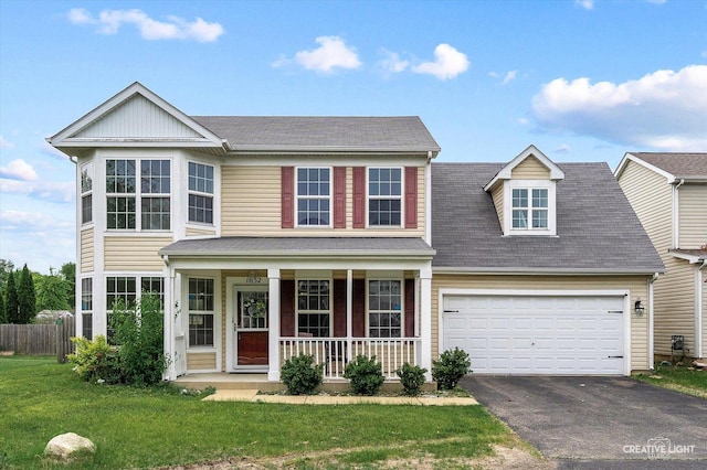 1632 Victoria Park Cir, Aurora, IL 60504 - traditional home with a porch, asphalt driveway, an attached garage, and roof with shingles