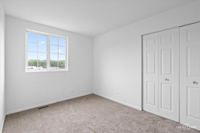 1632 Victoria Park Cir, Aurora, IL 60504 - unfurnished bedroom with carpet, a closet, and baseboards