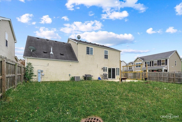 1632 Victoria Park Cir, Aurora, IL 60504 - back of house featuring central AC unit and roof with shingles