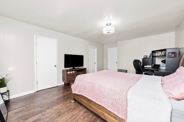 5401 W Arlington Dr, Hanover Park, IL 60133 - bedroom with dark wood finished floors and baseboards