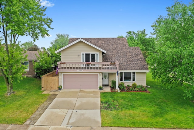5401 W Arlington Dr, Hanover Park, IL 60133 - traditional home with concrete driveway, a garage, a front yard, and roof with shingles