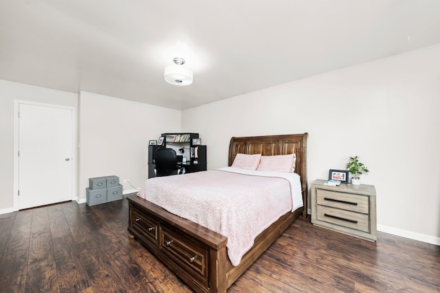 5401 W Arlington Dr, Hanover Park, IL 60133 - bedroom with dark wood-style flooring and baseboards