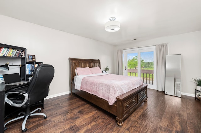 5401 W Arlington Dr, Hanover Park, IL 60133 - bedroom featuring access to exterior, dark wood-style floors, baseboards, and an office area