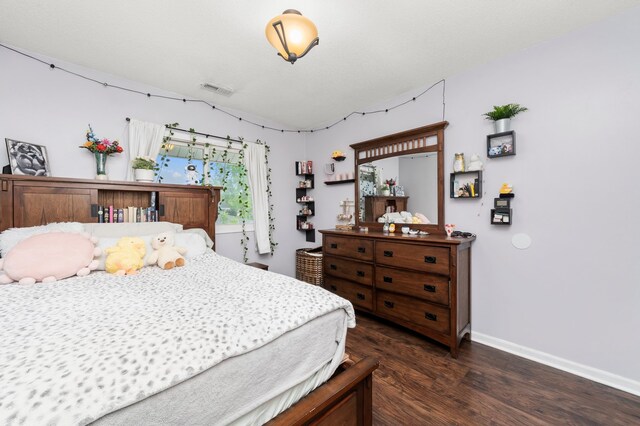 5401 W Arlington Dr, Hanover Park, IL 60133 - bedroom with wood finished floors and baseboards