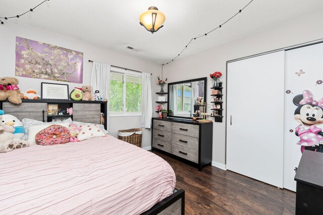 5401 W Arlington Dr, Hanover Park, IL 60133 - bedroom with wood finished floors and baseboards