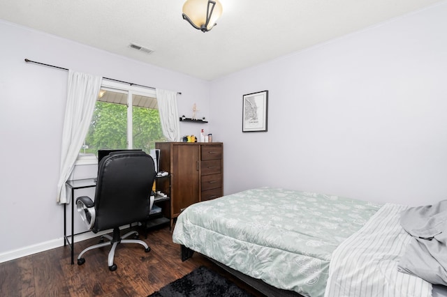 5401 W Arlington Dr, Hanover Park, IL 60133 - bedroom featuring wood finished floors, an office area, and baseboards