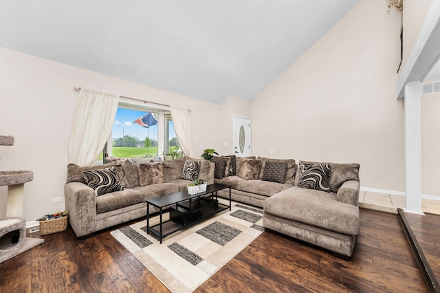 5401 W Arlington Dr, Hanover Park, IL 60133 - living area featuring high vaulted ceiling, wood finished floors, and baseboards