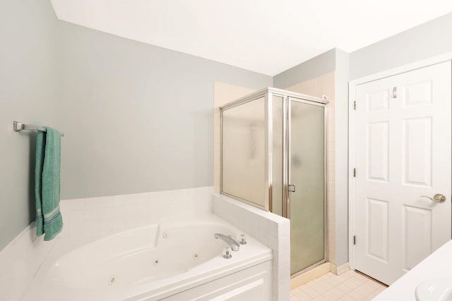 876 Dandridge Ct, Elgin, IL 60120 - full bath featuring a shower stall, a tub with jets, and tile patterned flooring