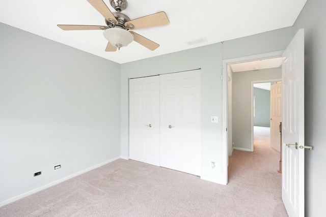 876 Dandridge Ct, Elgin, IL 60120 - unfurnished bedroom featuring light carpet, baseboards, a closet, and a ceiling fan