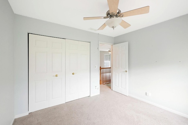 876 Dandridge Ct, Elgin, IL 60120 - unfurnished bedroom featuring carpet flooring, a closet, baseboards, and ceiling fan