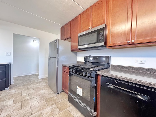 735 N Swift Rd Unit 102, Addison, IL 60101 - kitchen featuring appliances with stainless steel finishes, dark countertops, brown cabinetry, baseboards, and stone finish flooring