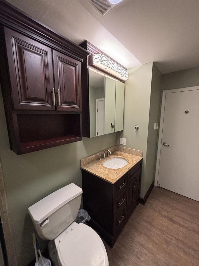 6525 Main St Unit 204, Downers Grove, IL 60516 - bathroom with vanity and wood finished floors