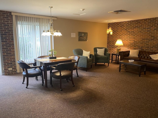 6525 Main St Unit 204, Downers Grove, IL 60516 - carpeted dining space featuring brick wall and a chandelier