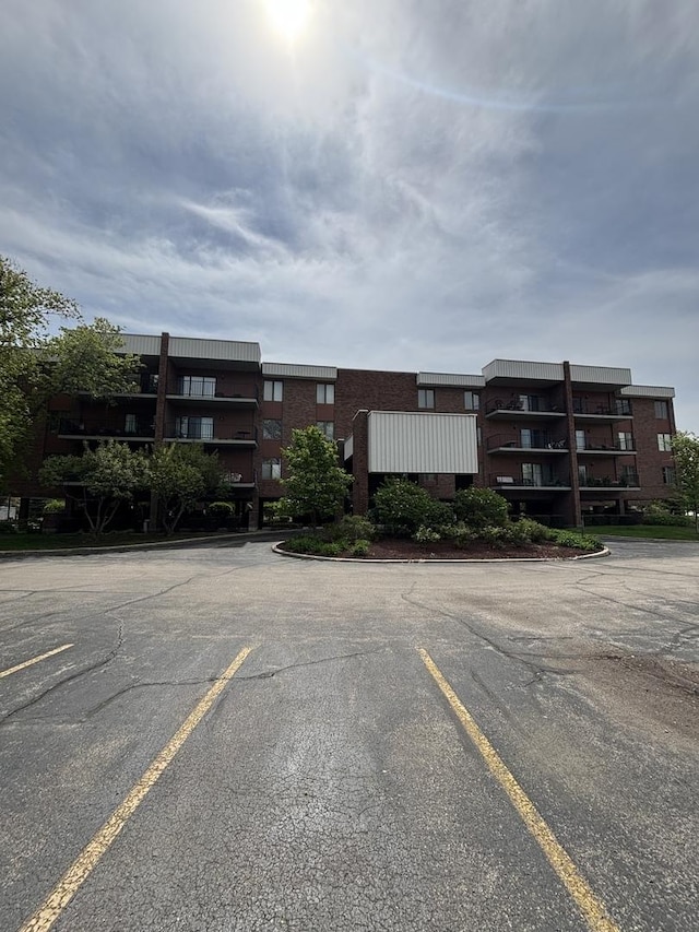 6525 Main St Unit 204, Downers Grove, IL 60516 - view of apartment building / complex featuring uncovered parking