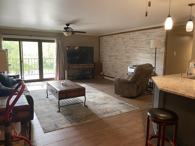 6525 Main St Unit 204, Downers Grove, IL 60516 - living room featuring a ceiling fan, crown molding, and wood finished floors