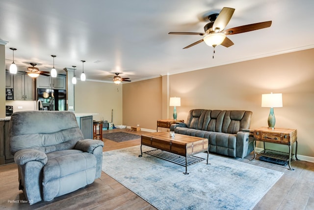 6525 Main St Unit 204, Downers Grove, IL 60516 - living room featuring a ceiling fan, light wood-type flooring, and ornamental molding