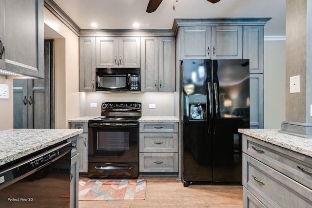 6525 Main St Unit 204, Downers Grove, IL 60516 - kitchen with black appliances, a ceiling fan, light stone countertops, light wood-style flooring, and recessed lighting