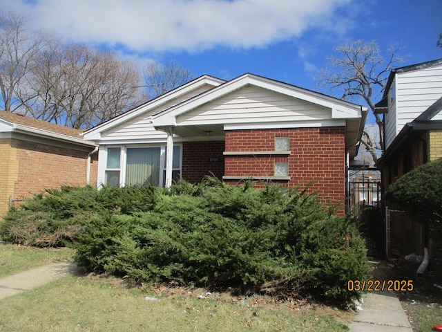 view of front of home with brick siding
