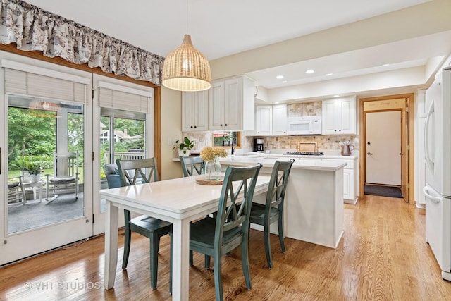 1965 Jamestown Ln, Elgin, IL 60123 - dining room featuring light wood-style flooring and recessed lighting