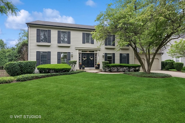 1965 Jamestown Ln, Elgin, IL 60123 - colonial-style house with a front lawn, driveway, and an attached garage