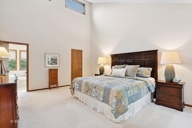 1965 Jamestown Ln, Elgin, IL 60123 - bedroom with light carpet, a high ceiling, and multiple windows