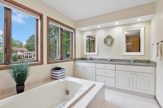 1965 Jamestown Ln, Elgin, IL 60123 - full bath with double vanity, a tub with jets, tile patterned floors, and recessed lighting