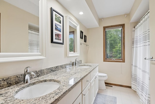 1965 Jamestown Ln, Elgin, IL 60123 - bathroom with double vanity, tile patterned floors, a shower with curtain, and recessed lighting