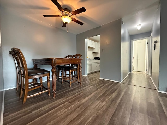 605 Hill Dr Unit 206, Hoffman Estates, IL 60169 - dining room with ceiling fan, dark wood-style floors, and baseboards