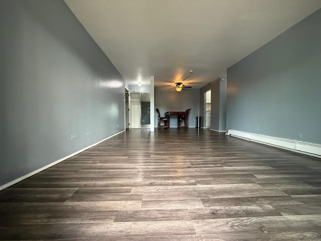 605 Hill Dr Unit 206, Hoffman Estates, IL 60169 - unfurnished living room with wood finished floors, ceiling fan, baseboard heating, and baseboards