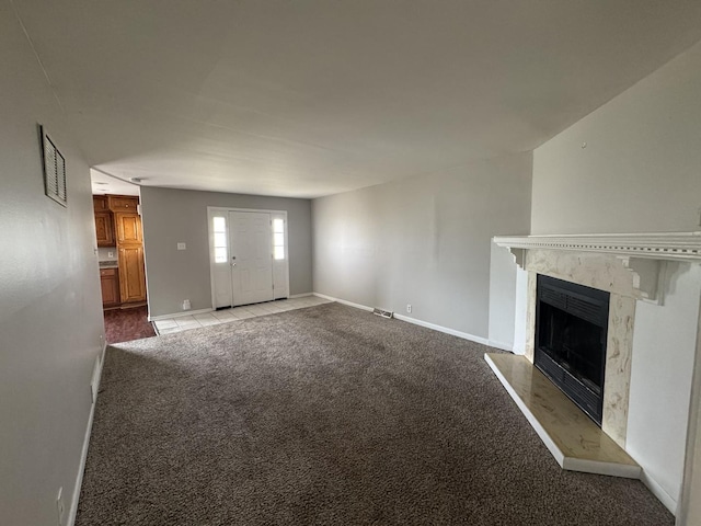 11709 S Kedzie Ave, Merrionette Park, IL 60803 - unfurnished living room with carpet, a high end fireplace, and baseboards