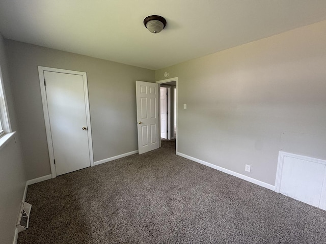 11709 S Kedzie Ave, Merrionette Park, IL 60803 - unfurnished bedroom with carpet flooring and baseboards