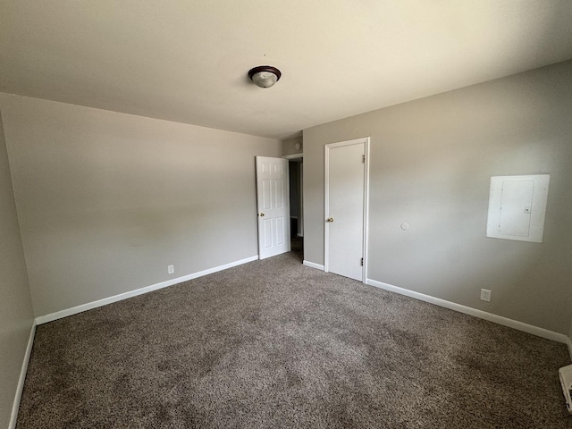 11709 S Kedzie Ave, Merrionette Park, IL 60803 - spare room with electric panel, carpet flooring, and baseboards