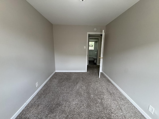 11709 S Kedzie Ave, Merrionette Park, IL 60803 - spare room featuring carpet flooring and baseboards