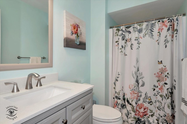 409 Manor Ct Unit A, New Lenox, IL 60451 - bathroom featuring vanity, toilet, and a shower with shower curtain