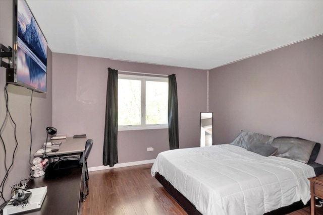 409 Manor Ct Unit A, New Lenox, IL 60451 - bedroom featuring dark wood finished floors and baseboards