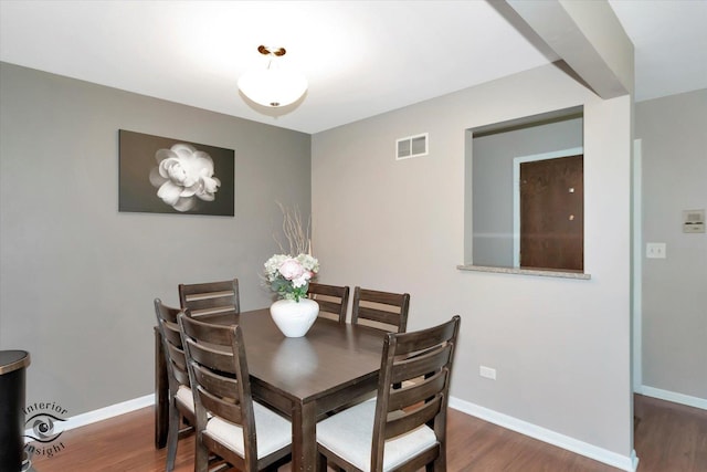 409 Manor Ct Unit A, New Lenox, IL 60451 - dining space featuring wood finished floors and baseboards