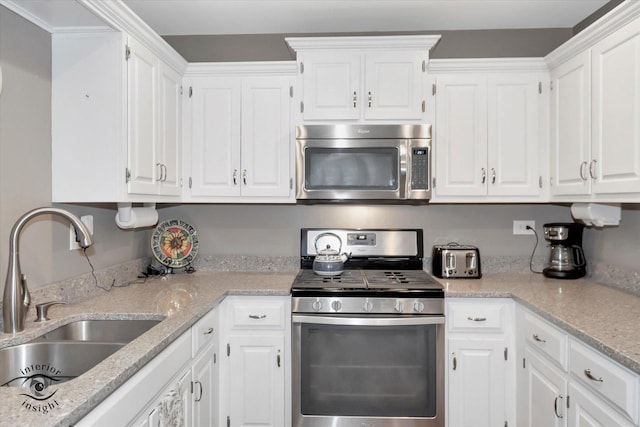 409 Manor Ct Unit A, New Lenox, IL 60451 - kitchen featuring stainless steel appliances, a sink, and white cabinets