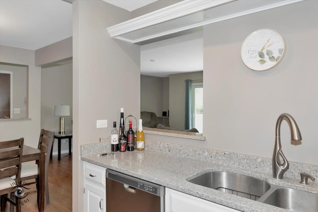 409 Manor Ct Unit A, New Lenox, IL 60451 - kitchen featuring dishwasher, a sink, white cabinetry, light stone countertops, and wood finished floors