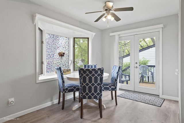 990 Magnolia Ave, Gurnee, IL 60031 - dining space with french doors, wood finished floors, and baseboards
