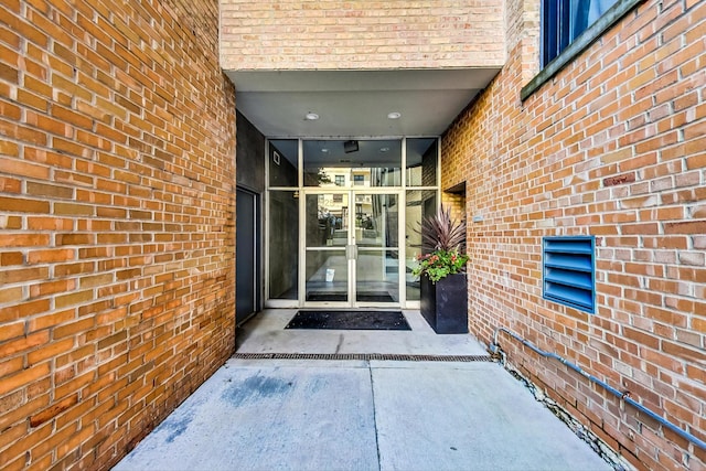 525 N Halsted St Unit 409, Chicago, IL 60642 - property entrance featuring brick siding