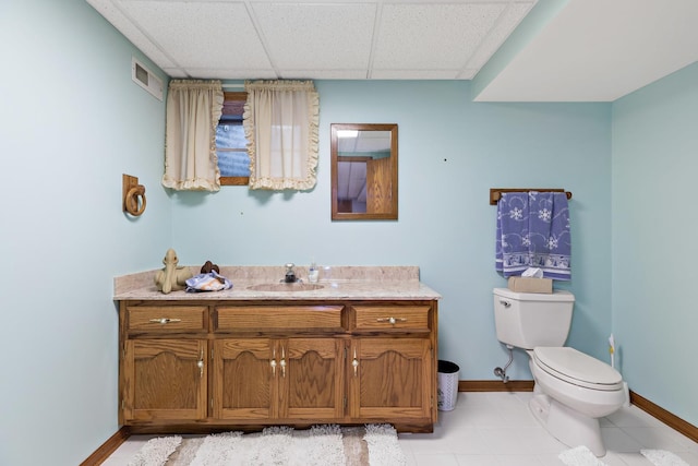 172 Hamilton Ave, Frankfort, IL 60423 - bathroom with toilet, vanity, baseboards, and a paneled ceiling