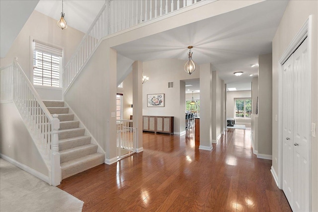 13093 Timber Ct Unit 61, Palos Heights, IL 60463 - entrance foyer featuring wood finished floors, stairs, and a high ceiling